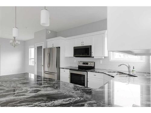 131 Athabasca Crescent, Fort Mcmurray, AB - Indoor Photo Showing Kitchen With Double Sink