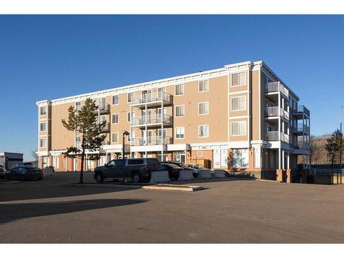 202-10217 Queen Street, Fort Mcmurray, AB - Outdoor With Balcony With Facade