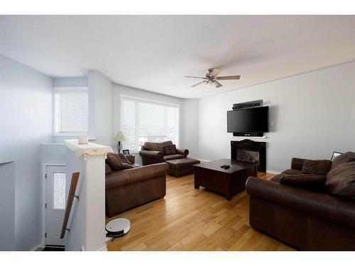 217 Crown Creek Lane, Fort Mcmurray, AB - Indoor Photo Showing Living Room With Fireplace