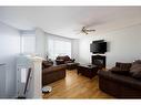 217 Crown Creek Lane, Fort Mcmurray, AB  - Indoor Photo Showing Living Room With Fireplace 