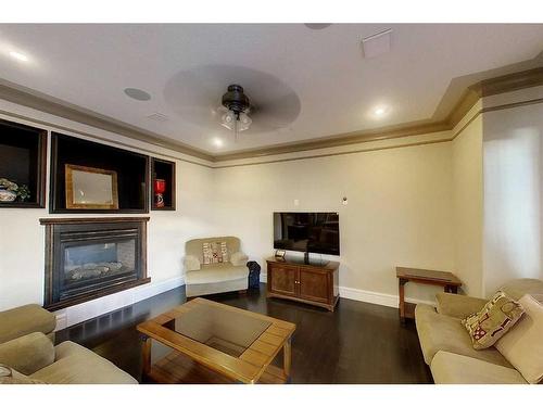 145 Stonecreek Landing, Fort Mcmurray, AB - Indoor Photo Showing Living Room With Fireplace