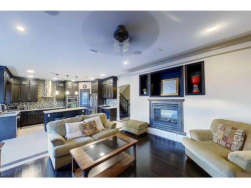 145 Stonecreek Landing, Fort Mcmurray, AB - Indoor Photo Showing Living Room With Fireplace