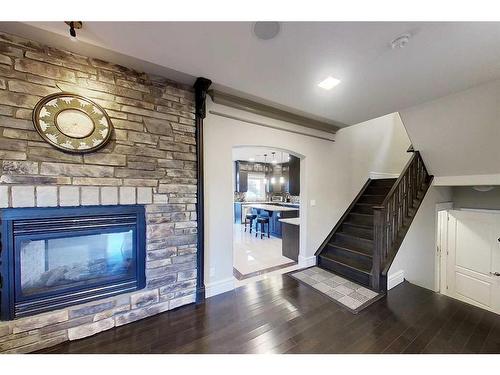 145 Stonecreek Landing, Fort Mcmurray, AB - Indoor Photo Showing Living Room With Fireplace