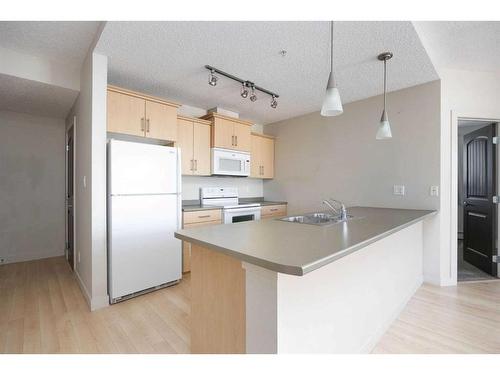 2614-135B Sandpiper Road, Fort Mcmurray, AB - Indoor Photo Showing Kitchen With Double Sink