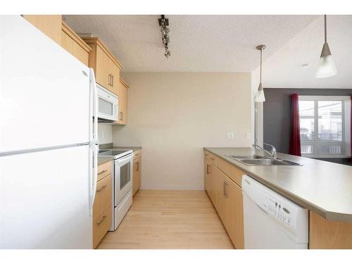 2614-135B Sandpiper Road, Fort Mcmurray, AB - Indoor Photo Showing Kitchen With Double Sink