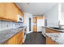 79 Powder Drive, Fort Mcmurray, AB  - Indoor Photo Showing Kitchen 