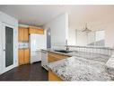 79 Powder Drive, Fort Mcmurray, AB  - Indoor Photo Showing Kitchen 