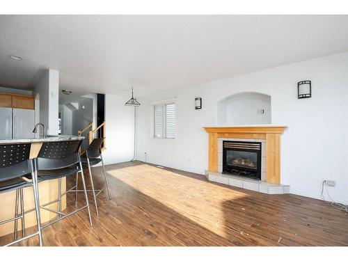 79 Powder Drive, Fort Mcmurray, AB - Indoor Photo Showing Living Room With Fireplace