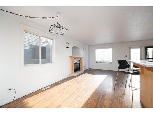 79 Powder Drive, Fort Mcmurray, AB - Indoor Photo Showing Living Room With Fireplace