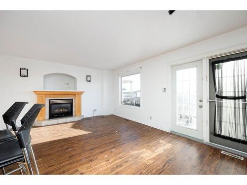 79 Powder Drive, Fort Mcmurray, AB - Indoor Photo Showing Living Room With Fireplace