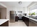 113 Goodwin Place, Fort Mcmurray, AB  - Indoor Photo Showing Kitchen With Double Sink 