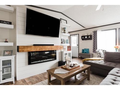 785 Beacon Hill Drive, Fort Mcmurray, AB - Indoor Photo Showing Living Room With Fireplace