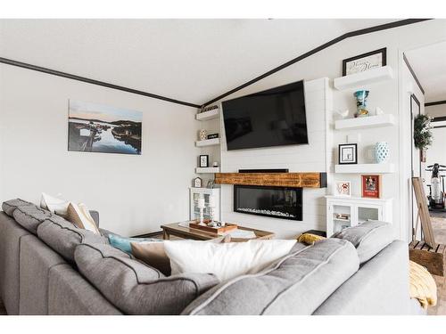 785 Beacon Hill Drive, Fort Mcmurray, AB - Indoor Photo Showing Living Room With Fireplace