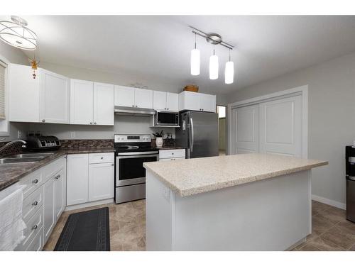 124 Blanchett Road, Fort Mcmurray, AB - Indoor Photo Showing Kitchen With Double Sink