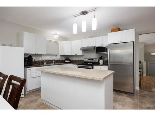 124 Blanchett Road, Fort Mcmurray, AB - Indoor Photo Showing Kitchen With Double Sink