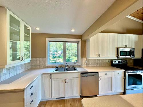 126-67339 Mission Road, Lac La Biche, AB - Indoor Photo Showing Kitchen With Stainless Steel Kitchen With Double Sink