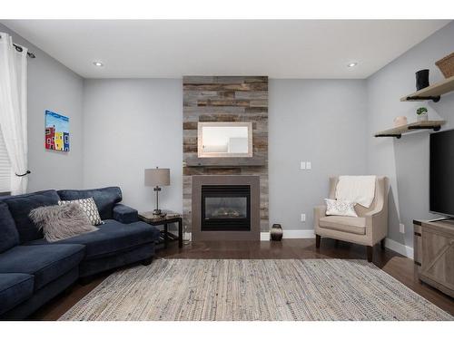 112 Comeau Crescent, Fort Mcmurray, AB - Indoor Photo Showing Living Room With Fireplace