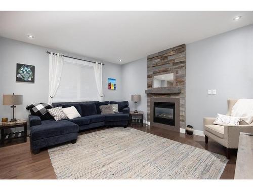 112 Comeau Crescent, Fort Mcmurray, AB - Indoor Photo Showing Living Room With Fireplace