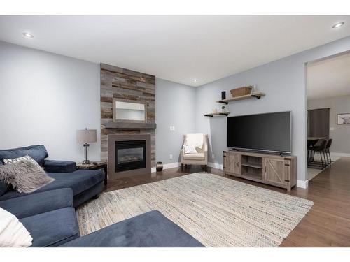 112 Comeau Crescent, Fort Mcmurray, AB - Indoor Photo Showing Living Room With Fireplace