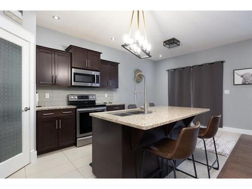 112 Comeau Crescent, Fort Mcmurray, AB - Indoor Photo Showing Kitchen With Double Sink