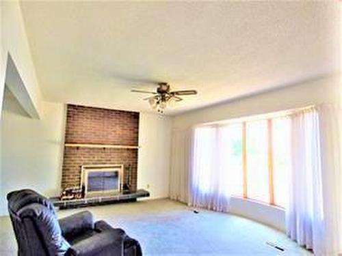 10205 105 Street, Lac La Biche, AB - Indoor With Fireplace