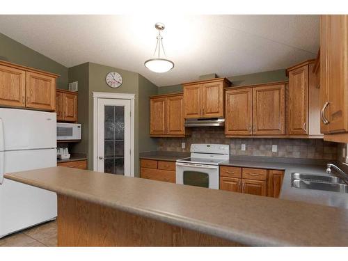 113 Paris Crescent, Fort Mcmurray, AB - Indoor Photo Showing Kitchen With Double Sink