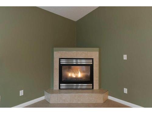 113 Paris Crescent, Fort Mcmurray, AB - Indoor Photo Showing Living Room With Fireplace