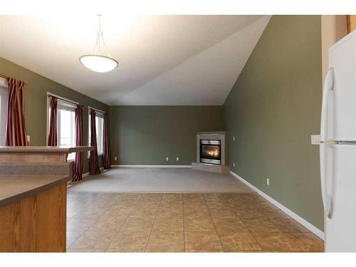 113 Paris Crescent, Fort Mcmurray, AB - Indoor Photo Showing Other Room With Fireplace