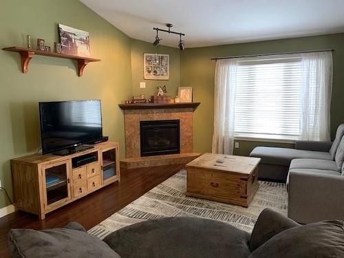 9602 100 Avenue, Lac La Biche, AB - Indoor Photo Showing Living Room With Fireplace