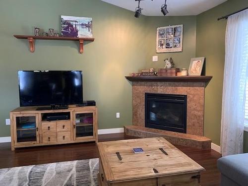 9602 100 Avenue, Lac La Biche, AB - Indoor Photo Showing Living Room With Fireplace