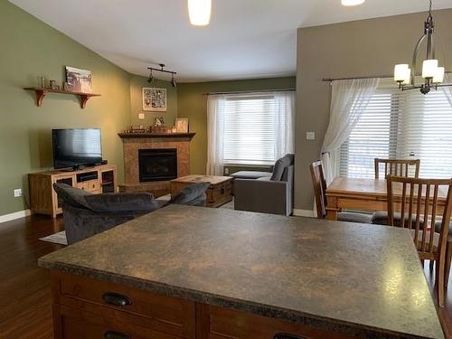 9602 100 Avenue, Lac La Biche, AB - Indoor Photo Showing Dining Room With Fireplace