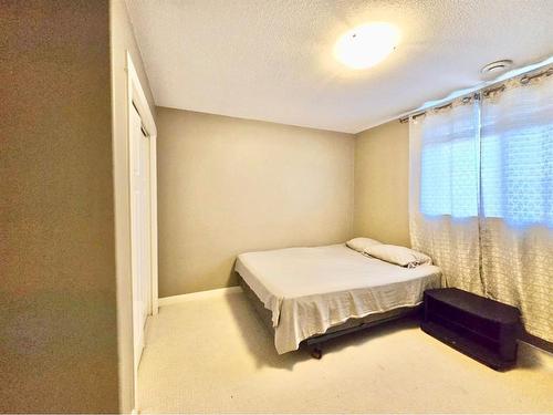 9602 100 Avenue, Lac La Biche, AB - Indoor Photo Showing Bedroom