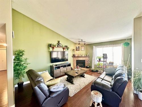 9602 100 Avenue, Lac La Biche, AB - Indoor Photo Showing Living Room With Fireplace