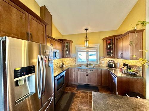 9602 100 Avenue, Lac La Biche, AB - Indoor Photo Showing Kitchen With Double Sink