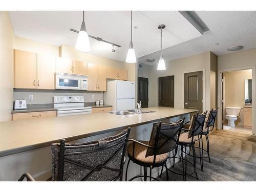 106-136C Sandpiper Road, Fort Mcmurray, AB - Indoor Photo Showing Kitchen With Double Sink