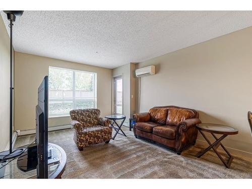 106-136C Sandpiper Road, Fort Mcmurray, AB - Indoor Photo Showing Living Room