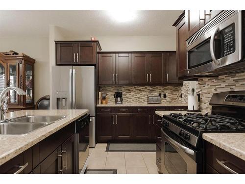 6-300 Sparrow Hawk Drive, Fort Mcmurray, AB - Indoor Photo Showing Kitchen With Stainless Steel Kitchen With Double Sink With Upgraded Kitchen