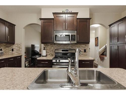 6-300 Sparrow Hawk Drive, Fort Mcmurray, AB - Indoor Photo Showing Kitchen With Double Sink