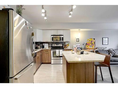 1313-7901 King Street, Fort Mcmurray, AB - Indoor Photo Showing Kitchen With Double Sink