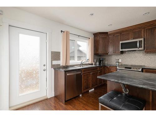 129 Airmont Court, Fort Mcmurray, AB - Indoor Photo Showing Kitchen With Double Sink