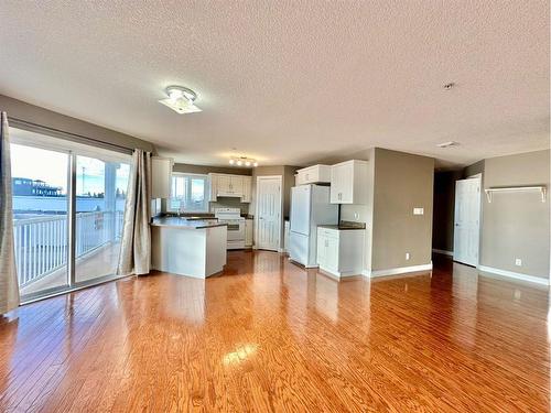 #210-10212 101 Street, Lac La Biche, AB - Indoor Photo Showing Kitchen