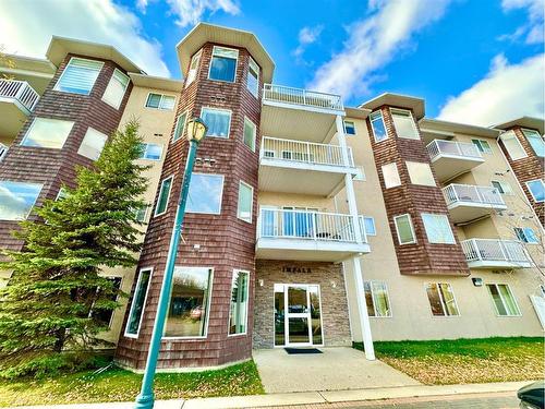 #210-10212 101 Street, Lac La Biche, AB - Outdoor With Balcony With Facade