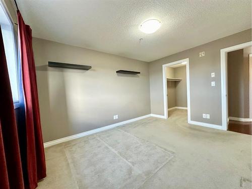 #210-10212 101 Street, Lac La Biche, AB - Indoor Photo Showing Other Room