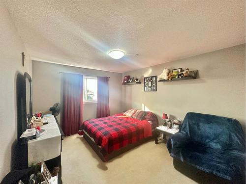 #210-10212 101 Street, Lac La Biche, AB - Indoor Photo Showing Bedroom