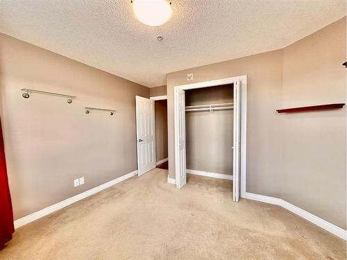 #210-10212 101 Street, Lac La Biche, AB - Indoor Photo Showing Other Room