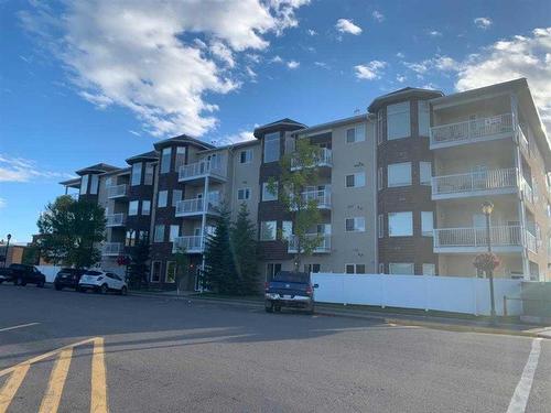 #210-10212 101 Street, Lac La Biche, AB - Outdoor With Balcony With Facade