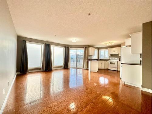 #210-10212 101 Street, Lac La Biche, AB - Indoor Photo Showing Kitchen