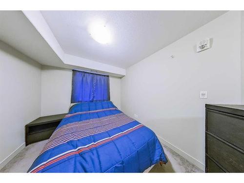 1422-7901 King Street, Fort Mcmurray, AB - Indoor Photo Showing Bedroom