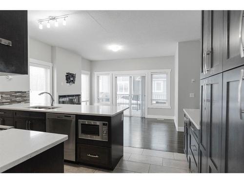 19-140 Fontaine Crescent, Fort Mcmurray, AB - Indoor Photo Showing Kitchen With Double Sink