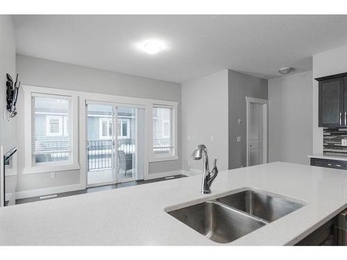 19-140 Fontaine Crescent, Fort Mcmurray, AB - Indoor Photo Showing Kitchen With Double Sink